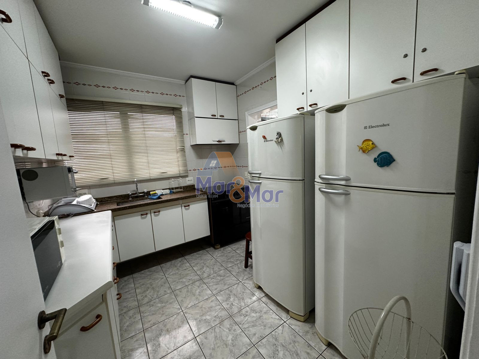 Apartamento na Praia das Pitangueiras, Guarujá - SP