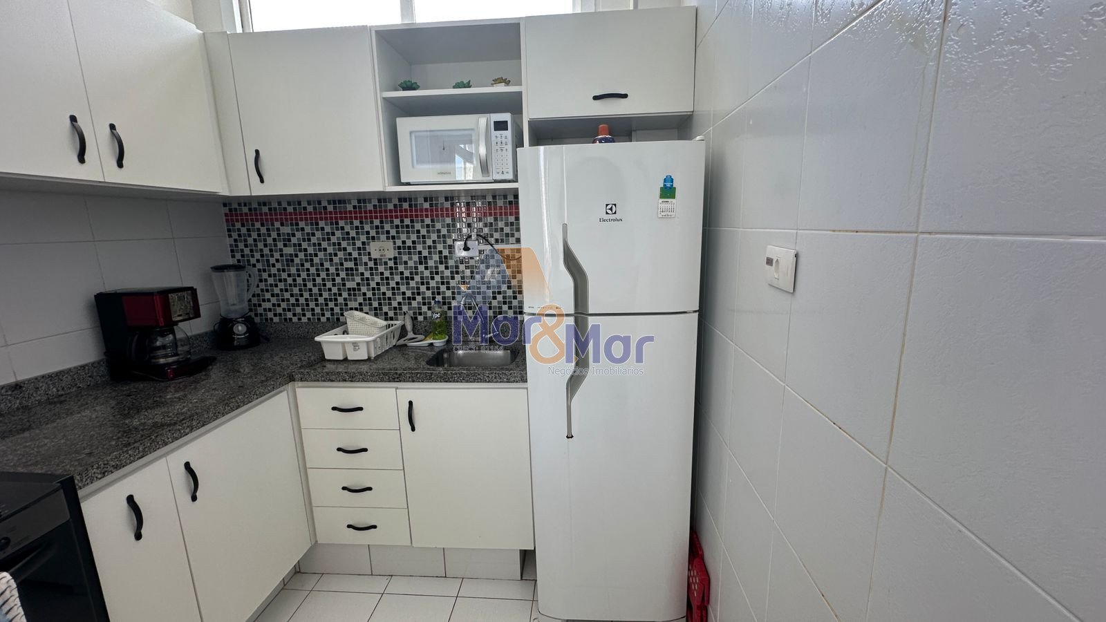 Apartamento na Praia das Pitangueiras, Guarujá - SP