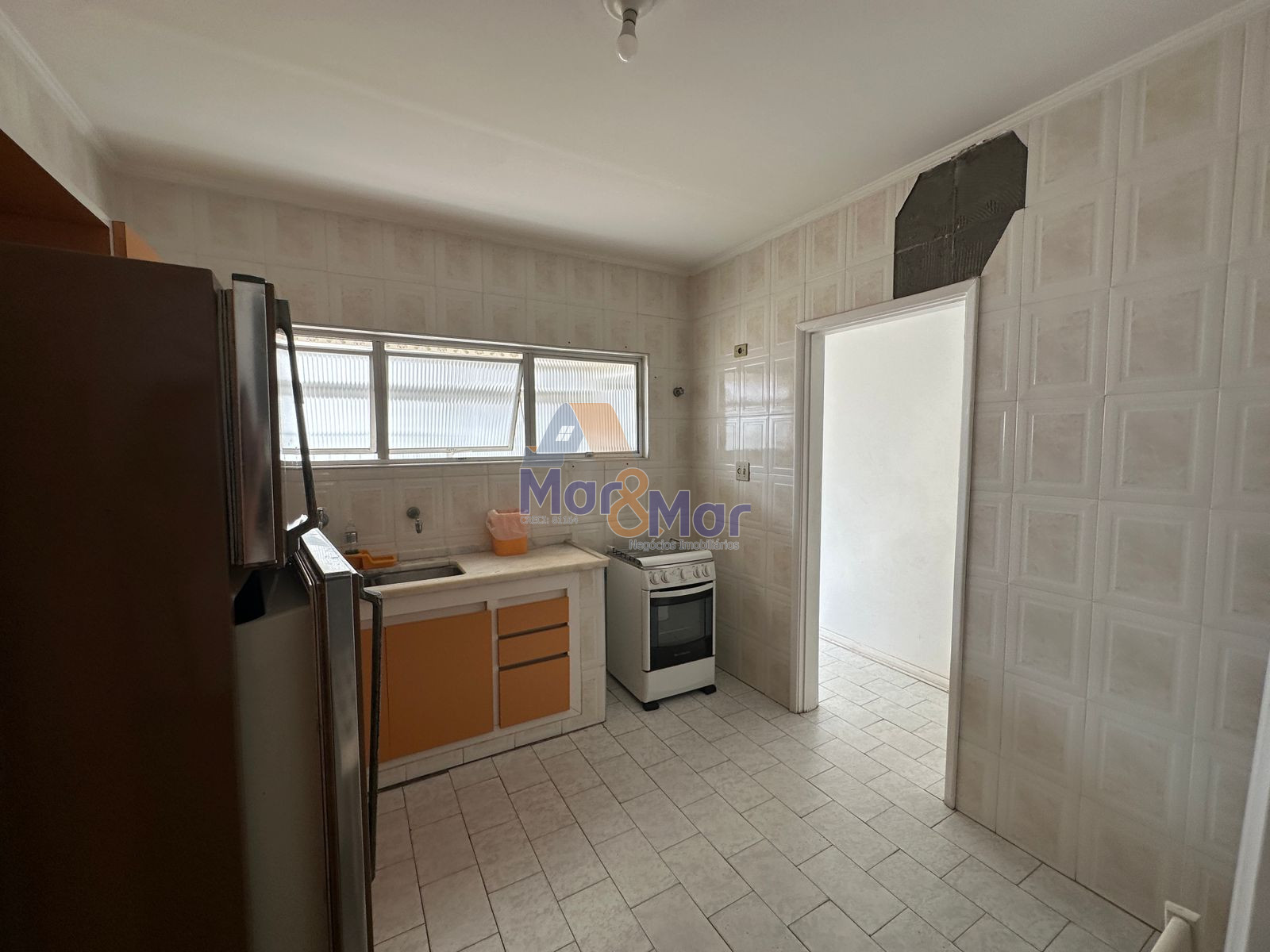 Apartamento na Praia das Pitangueiras, Guarujá - SP