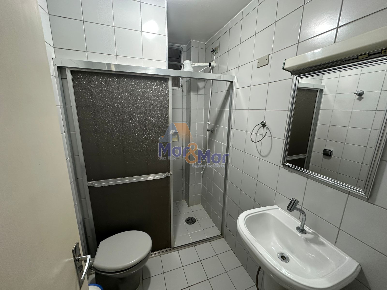 Apartamento na Praia das Pitangueiras, Guarujá - SP