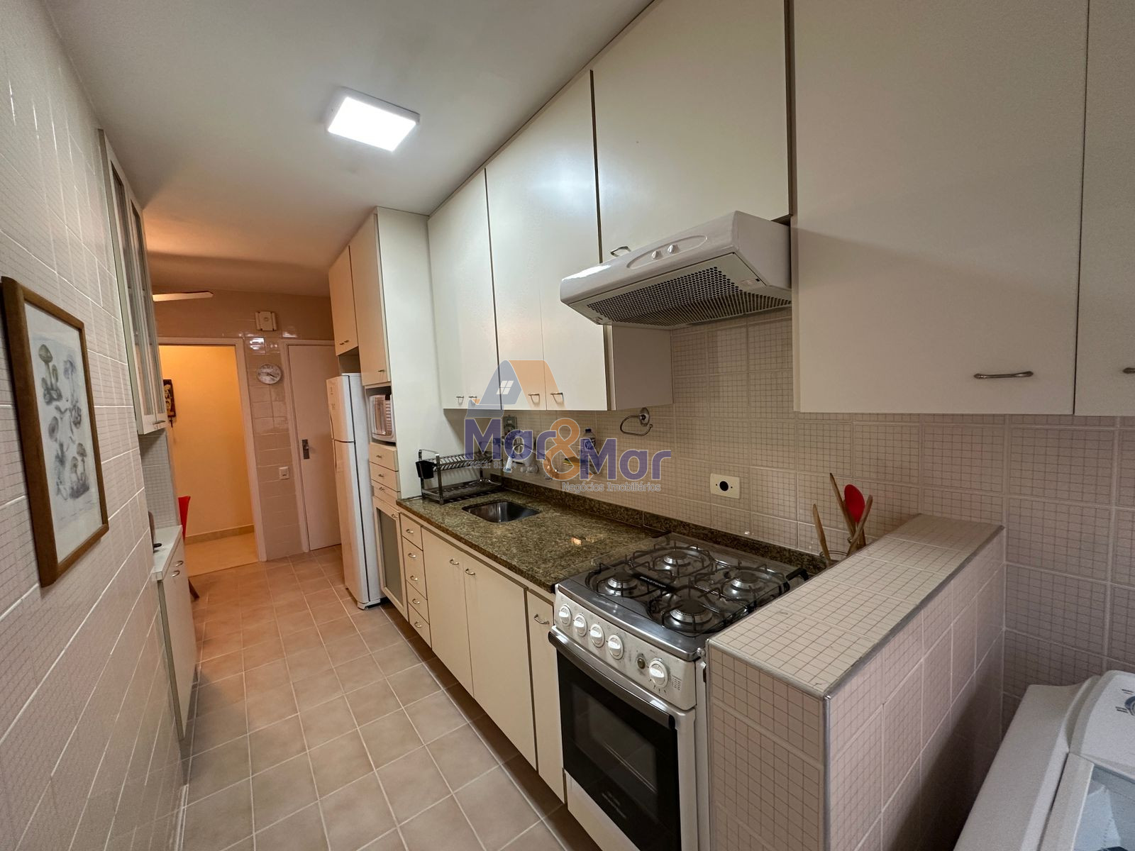 Apartamento na Praia das Pitangueiras, Guarujá - SP