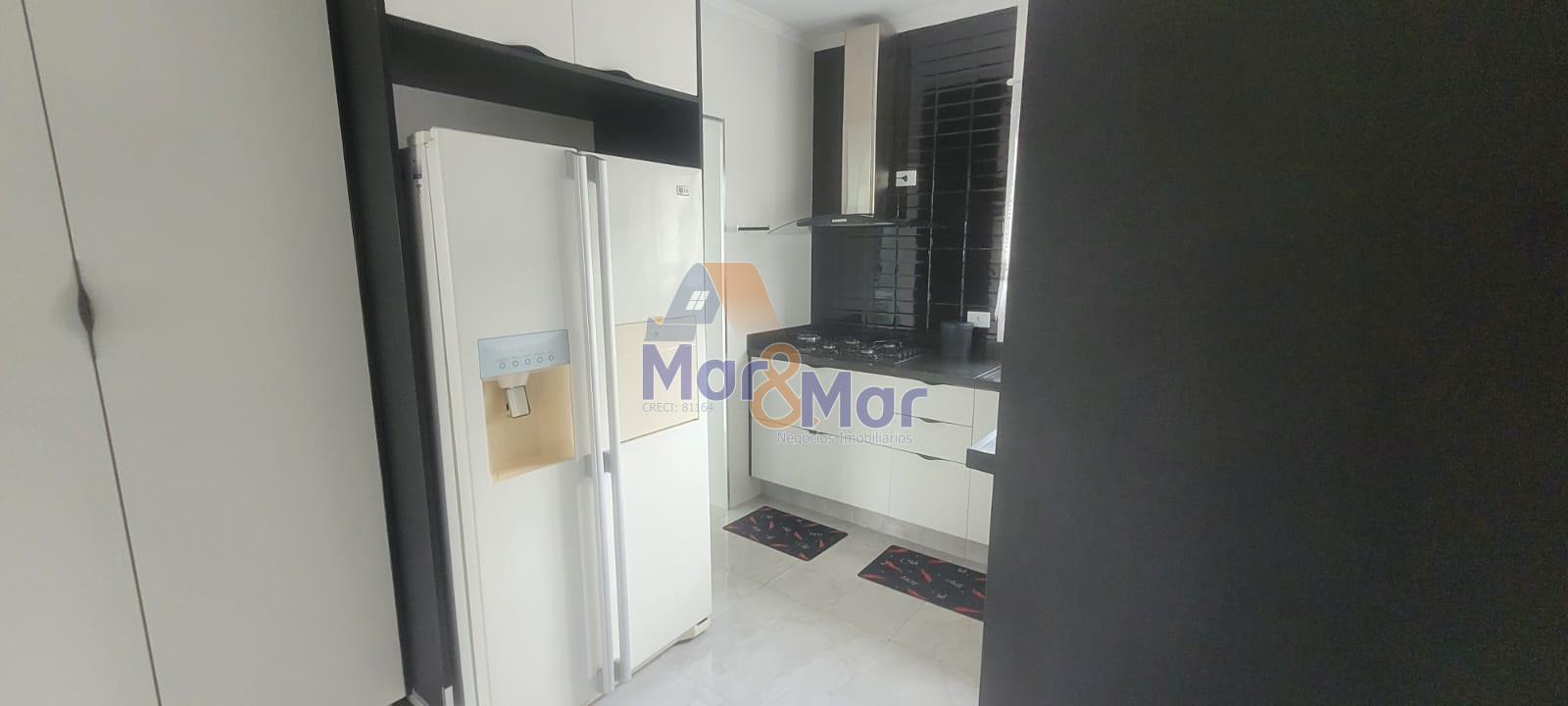 Apartamento na Praia das Pitangueiras, Guarujá - SP