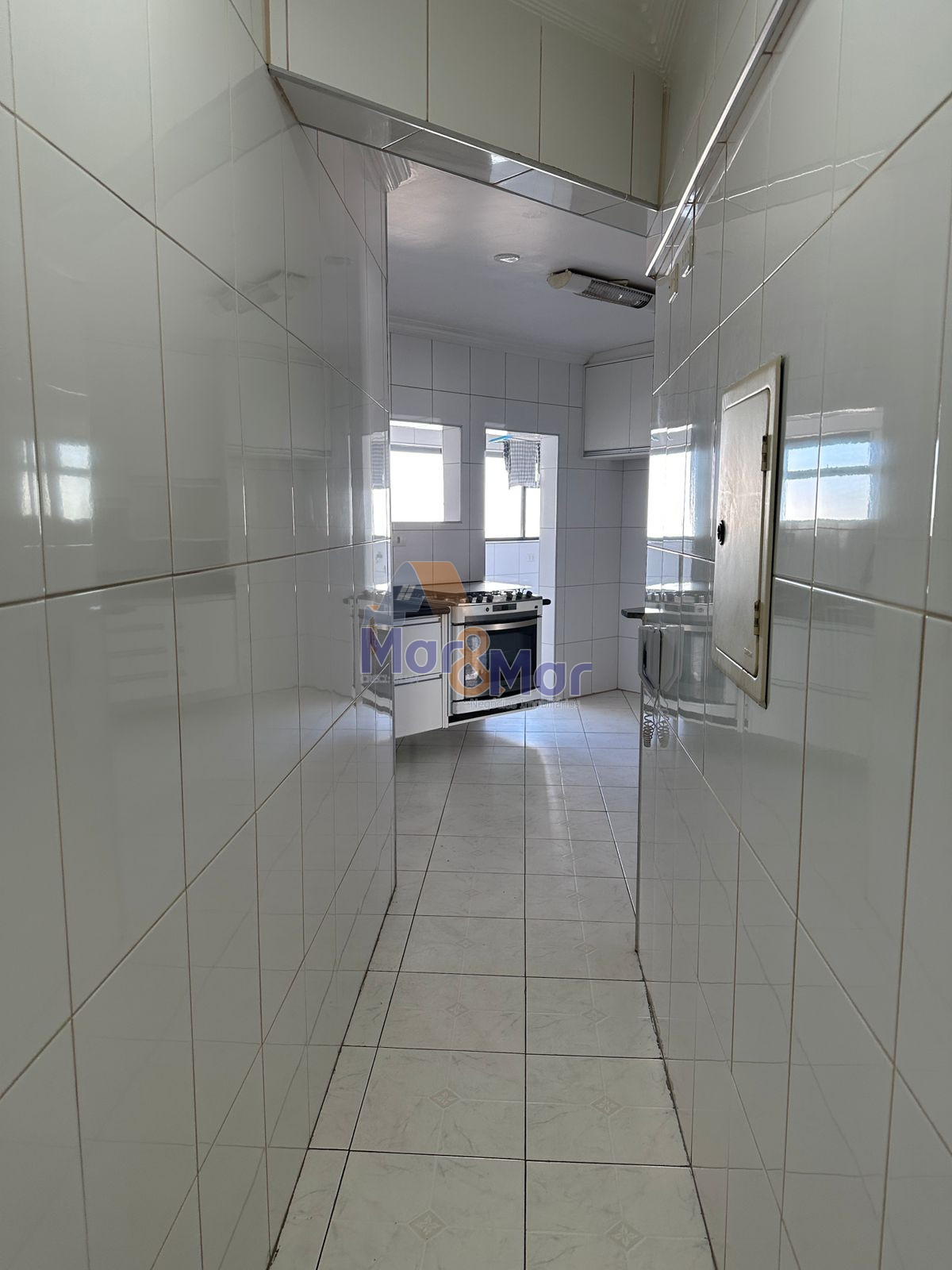 Apartamento na Praia das Pitangueiras, Guarujá - SP