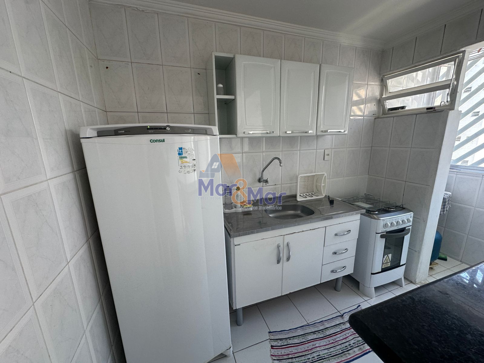 Apartamento na Praia das Pitangueiras, Guarujá - SP