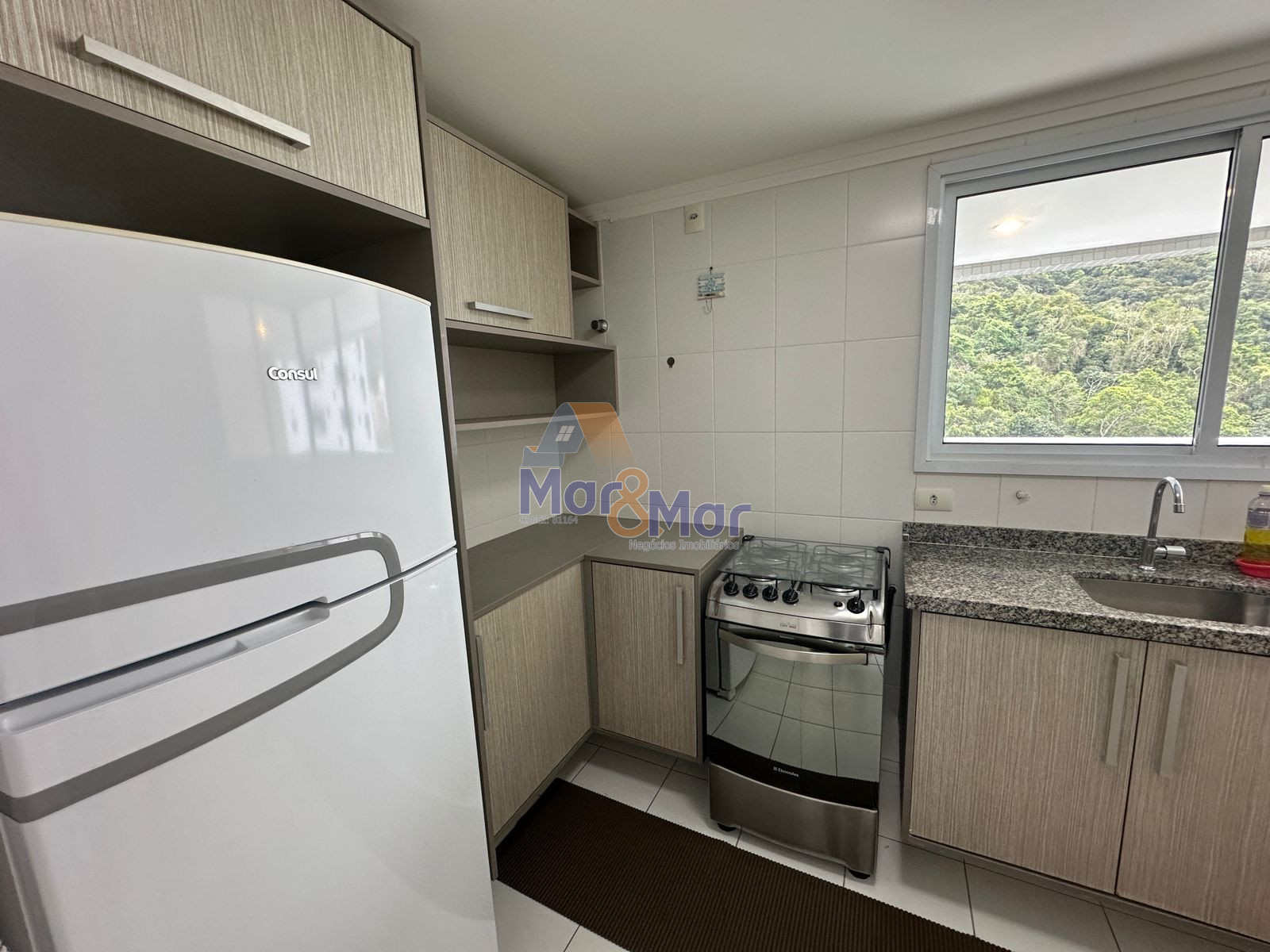 Apartamento na Praia das Pitangueiras, Guarujá - SP