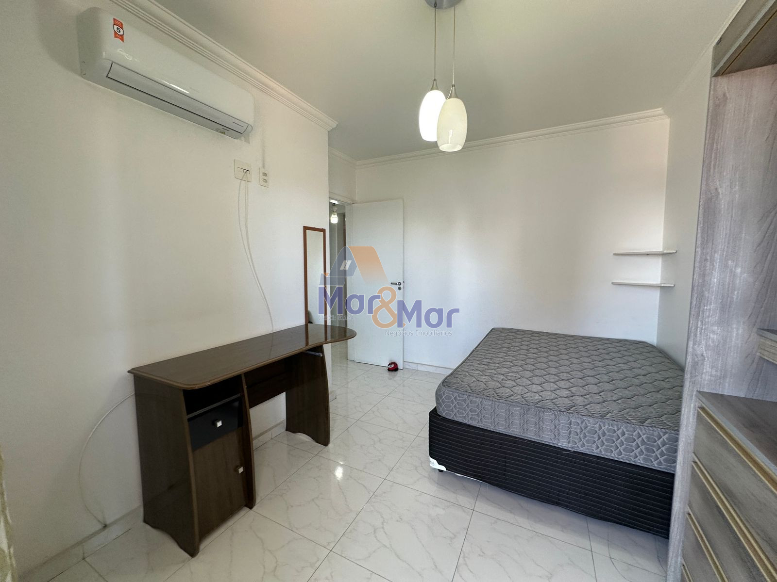 Apartamento na Praia das Astúrias, Guarujá - SP