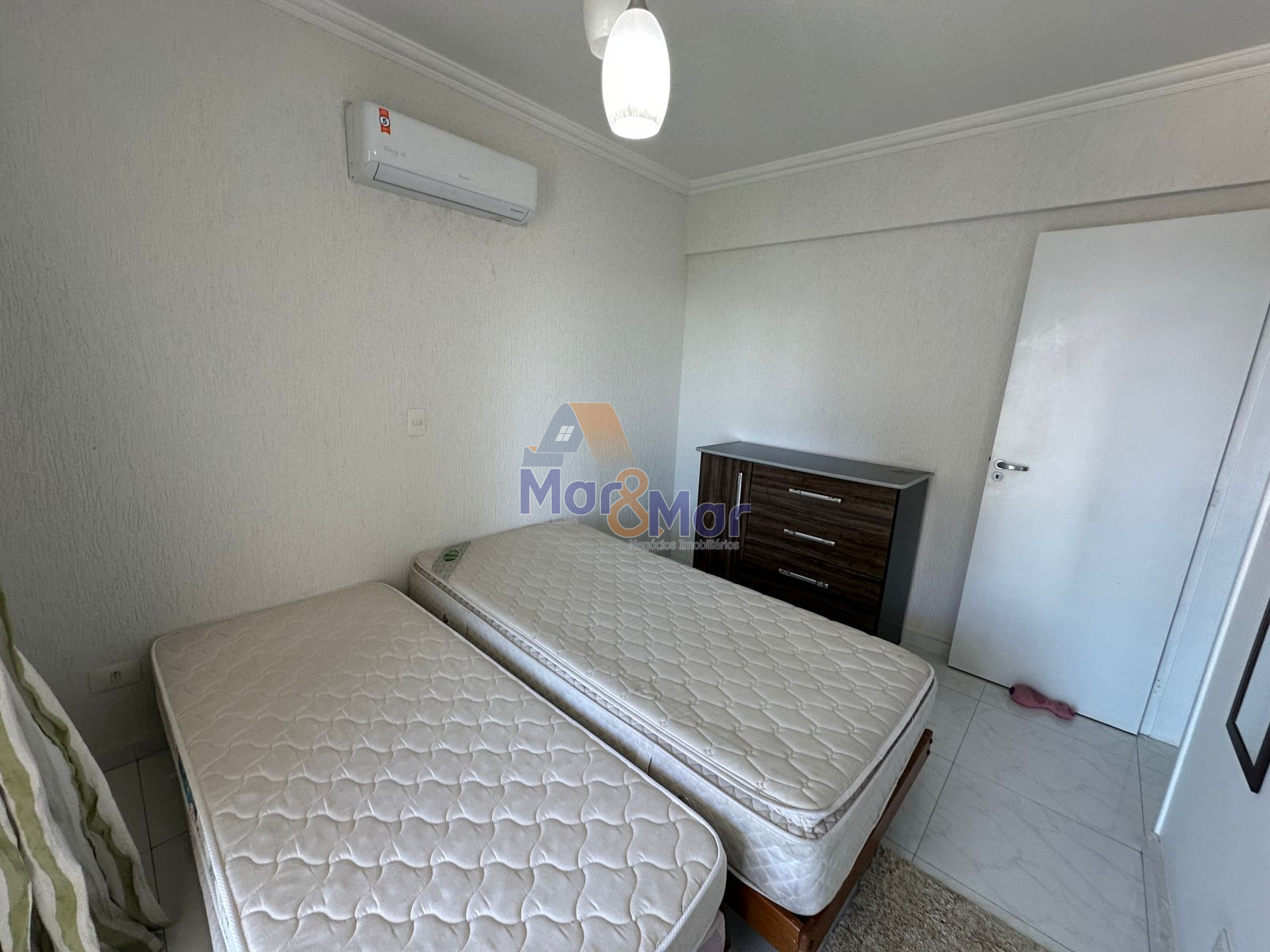 Apartamento na Praia das Astúrias, Guarujá - SP