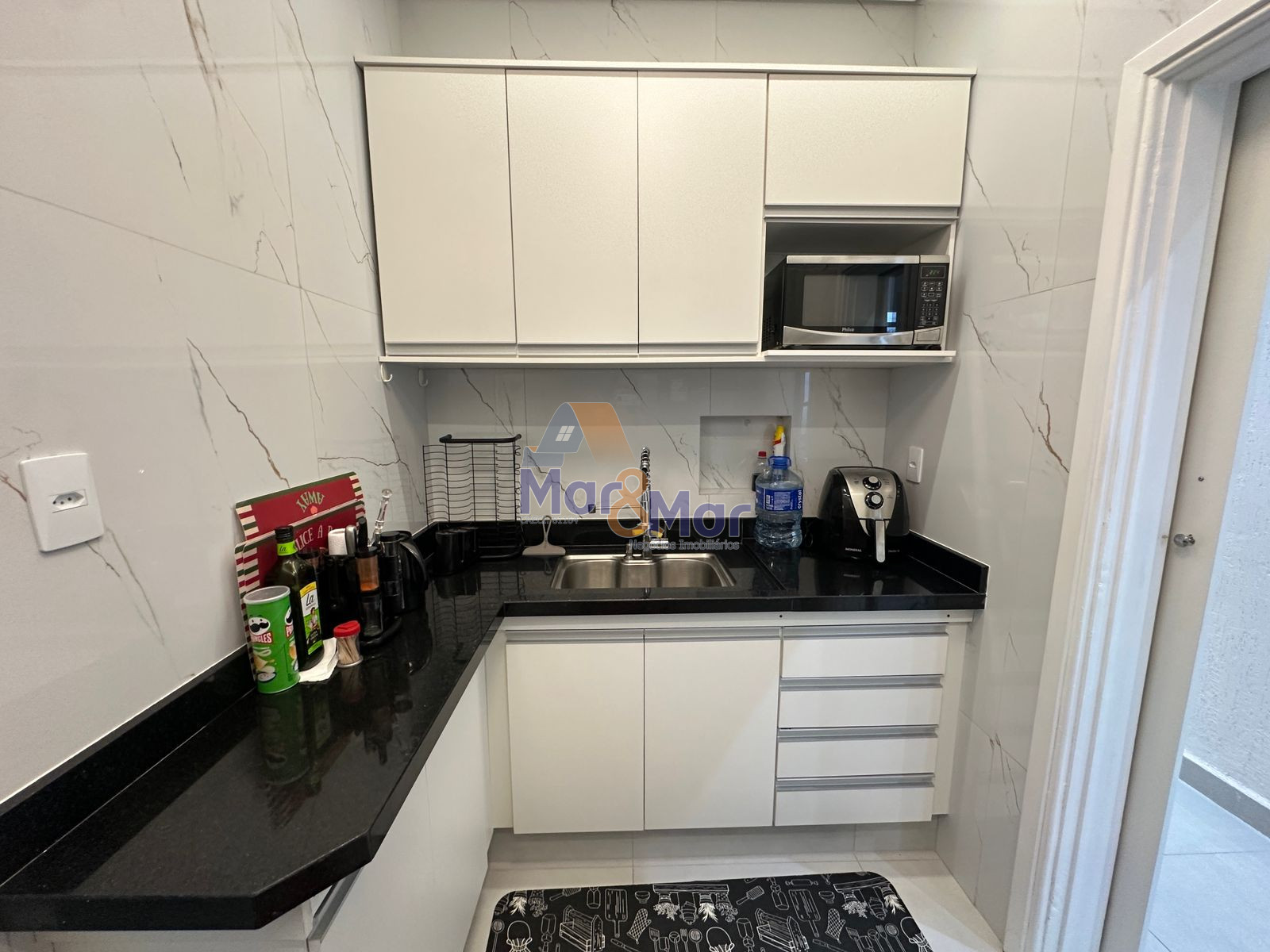 Apartamento na Praia das Pitangueiras, Guarujá - SP