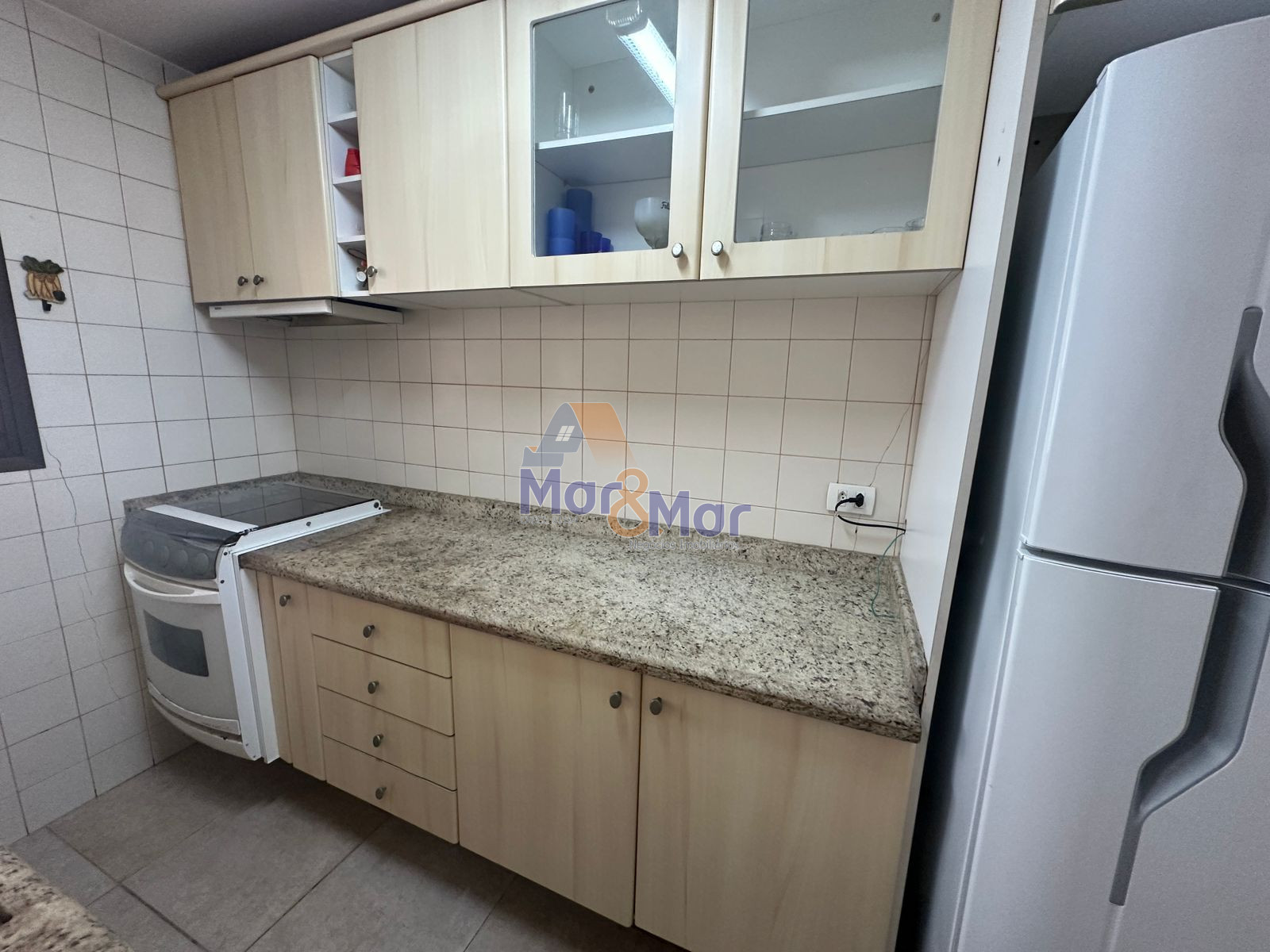 Apartamento na Praia das Pitangueiras, Guarujá - SP