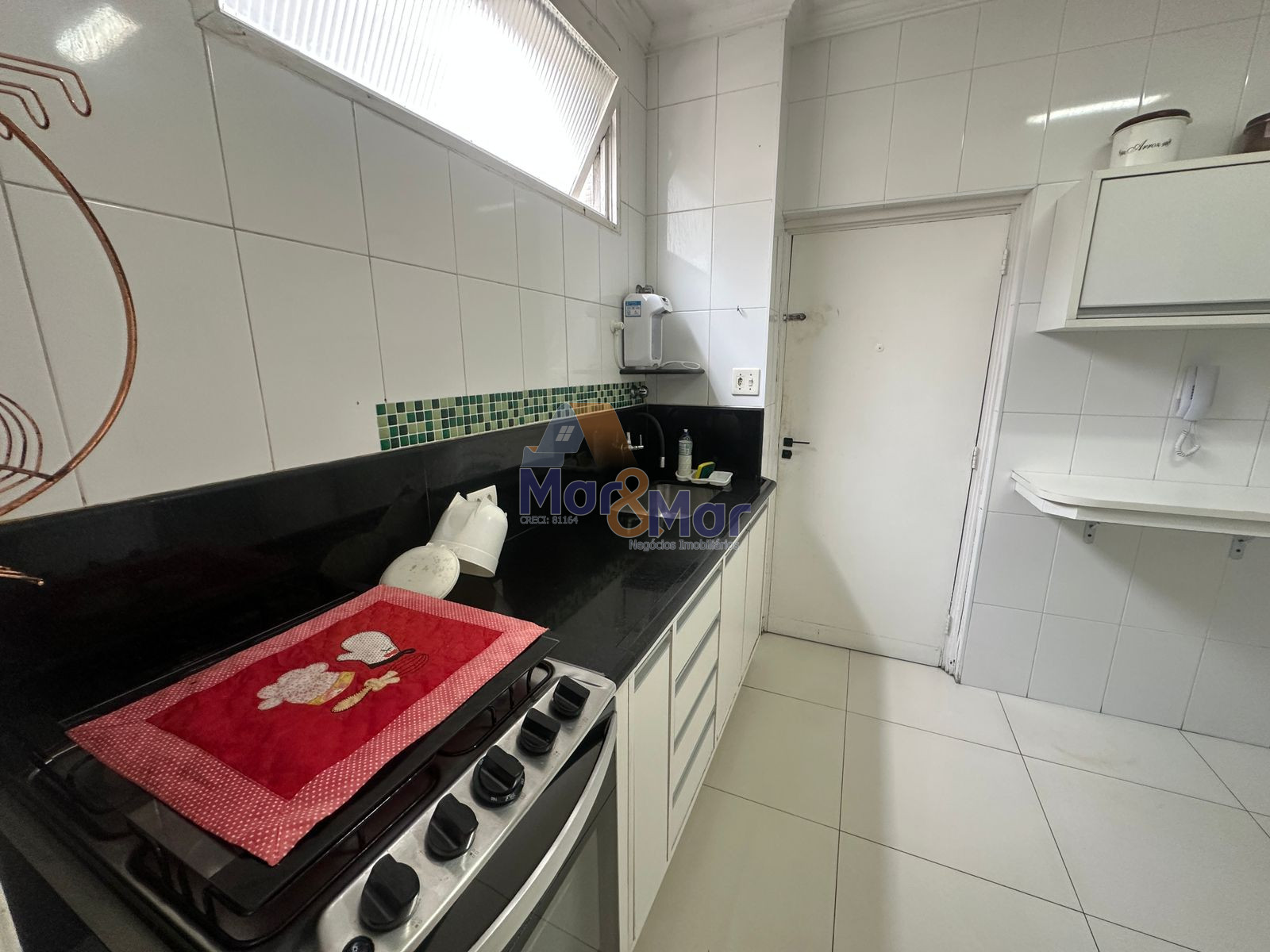 Apartamento na Praia das Pitangueiras, Guarujá - SP