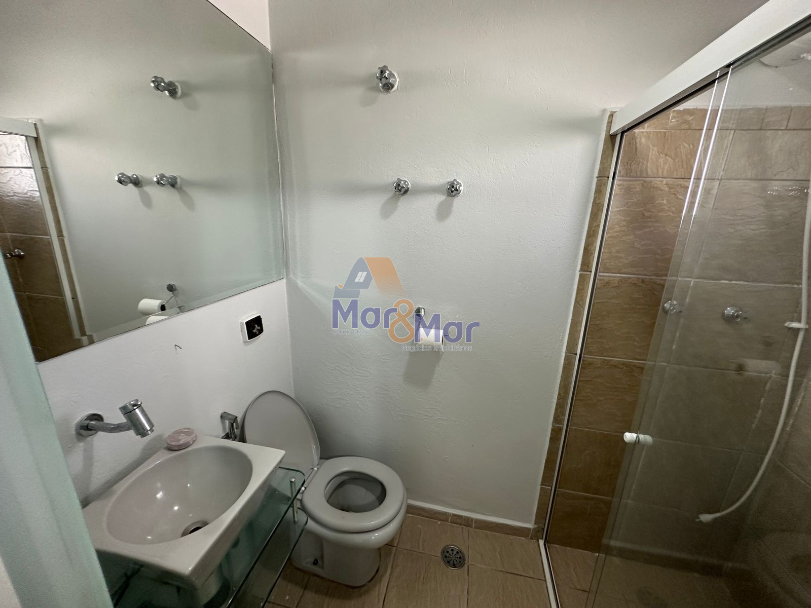 Apartamento na Praia das Pitangueiras, Guarujá - SP