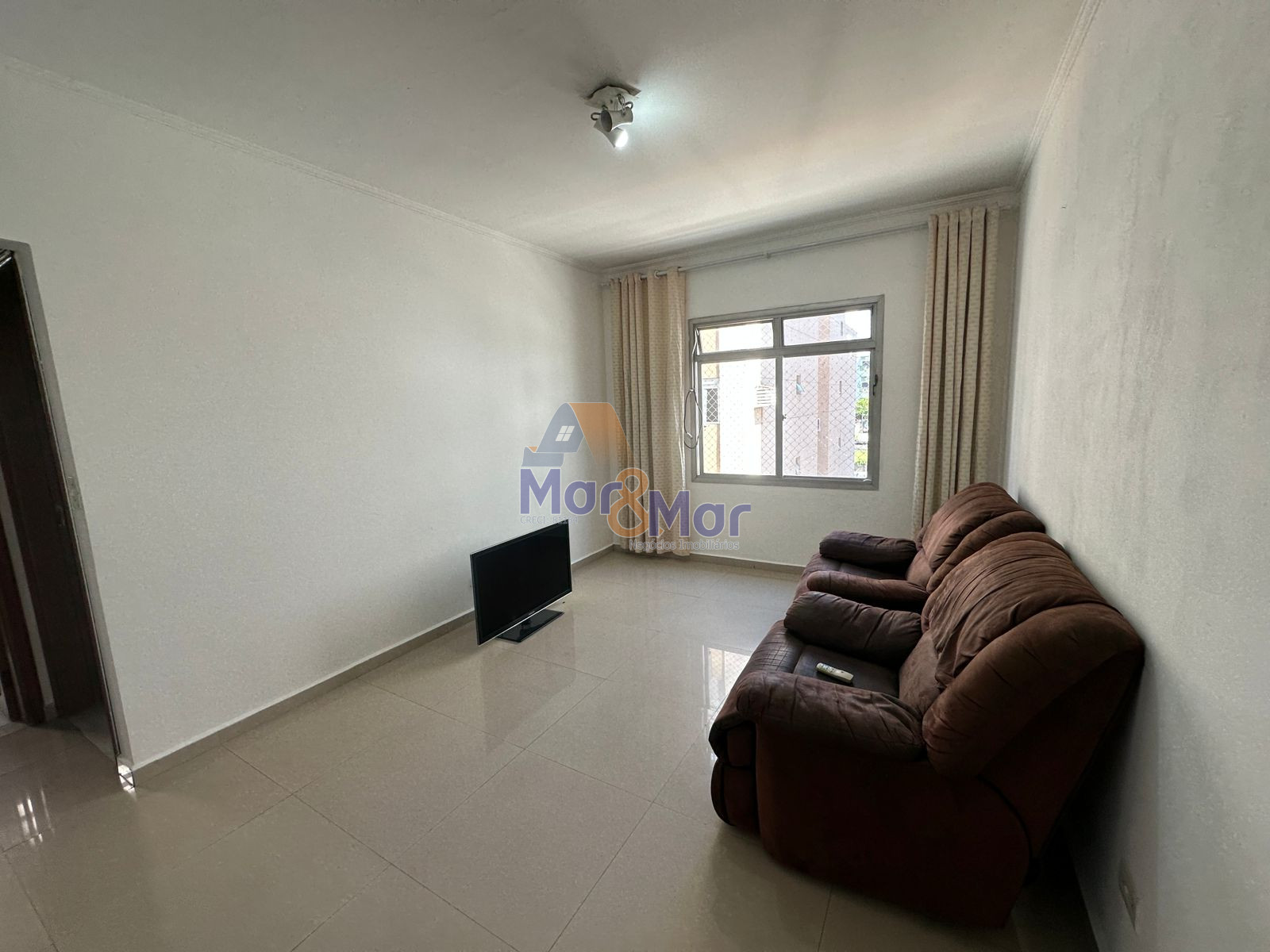 Apartamento na Praia das Astúrias, Guarujá - SP