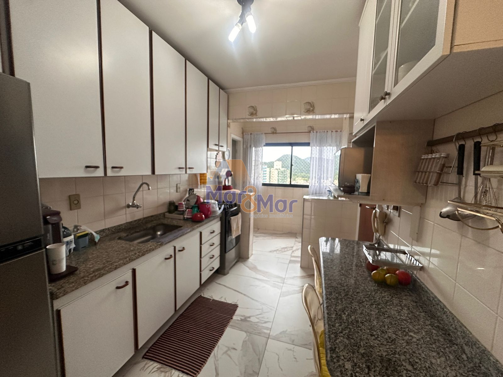 Apartamento na Praia das Astúrias, Guarujá - SP